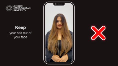 A photo of a student, on a cartoon phone where their hair is over their face and a red X on the right of the screen