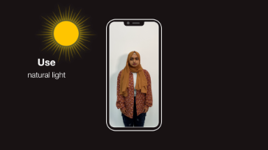 A photo of a student, on a cartoon phone with a cartoon sun in the top left corner