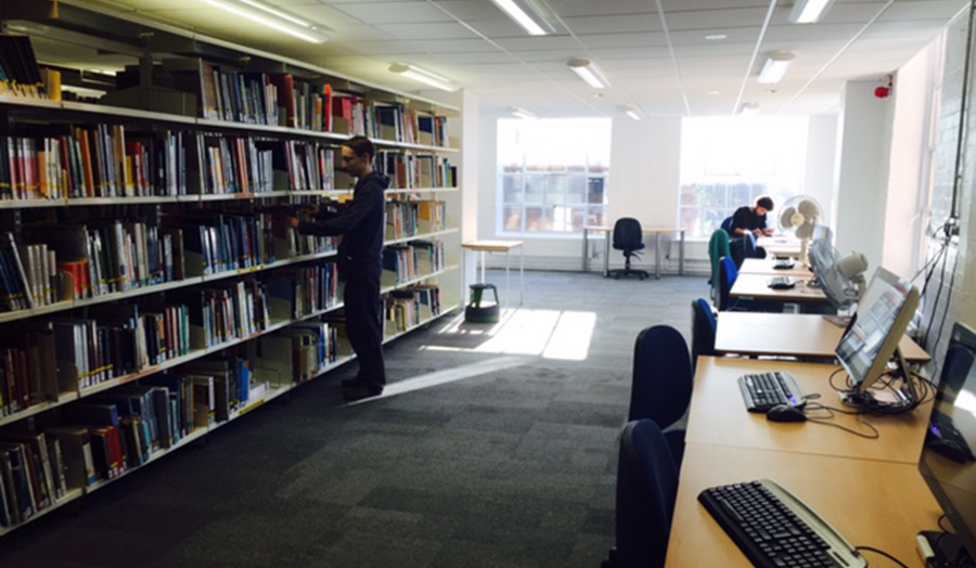 Books and desks in library