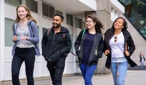 Four students walking