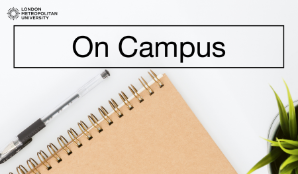 Image of a notebook and pen with headline On Campus