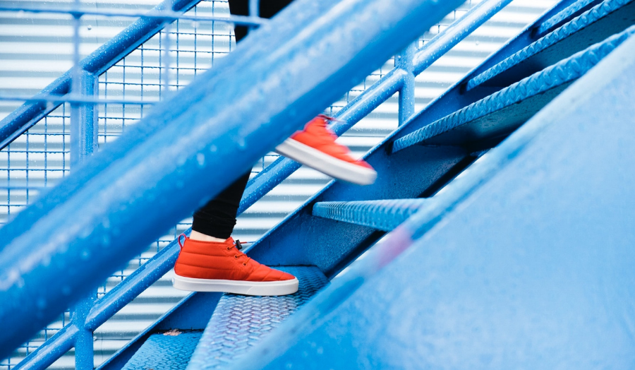 Feet walking up stairs