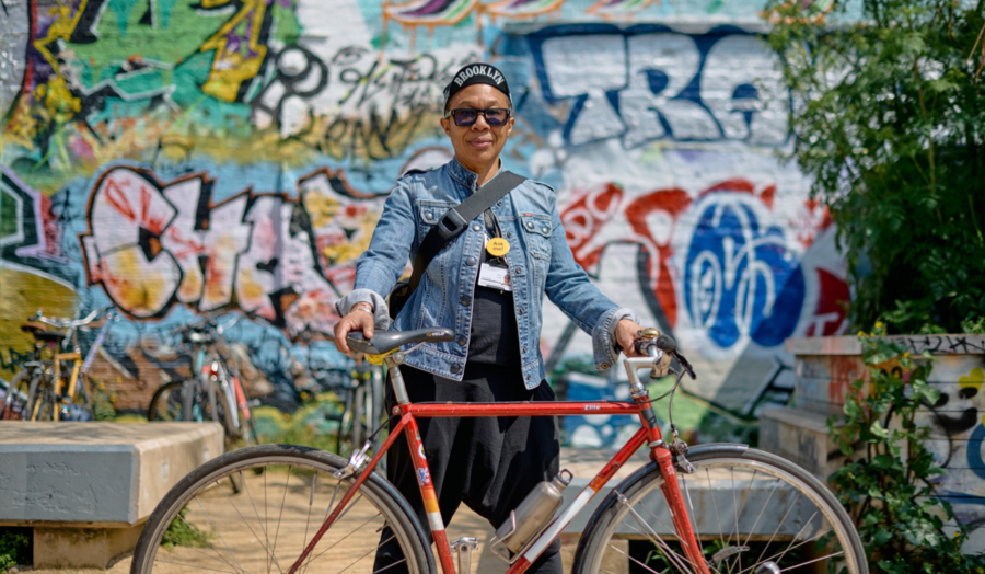 Donna Jones smiling with her bicycle