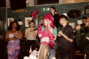 Crowd celebrating at the Rainbow Ball