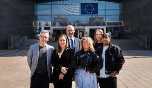 Group of people outside the European Parliament