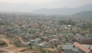 Panoramic view of Nepalese houses and mountains in the background